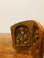 Sandalwood carved god inside shell