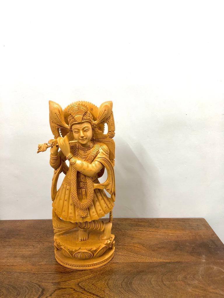 Wooden beautifully hand carved lord Krishna statue