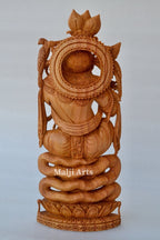 Baby Krishna sitting on snack fine wooden hand carved statue - Arts99 - Online Art Gallery