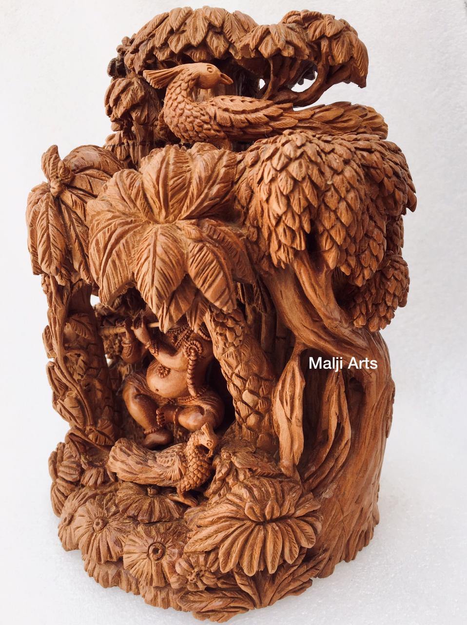 Sandalwood Baby krishna under tree playing flute - Arts99 - Online Art Gallery